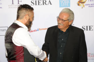Colin Gerrard (Eli) and Edward James Olmos