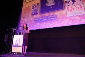 Arine Harapeti accepting Rising Star Award on behalf of Natalie Qasabian