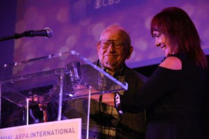 Ed Asner being presented with Icon Award from Arpa IFF Founder Sylvia Minassian